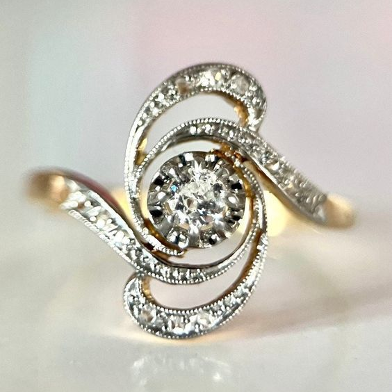 Vintage pierścionek złoty z spiralą z cyrkonii